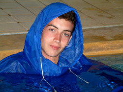 blue cagoule as modest swimwear in swimming pool